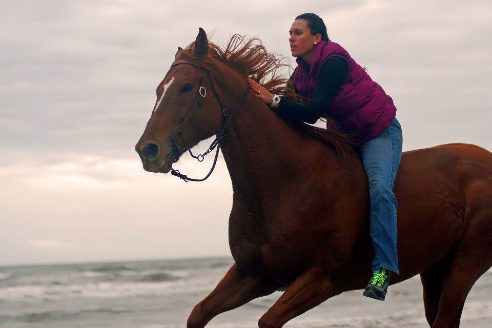Riding like the wind on a Thoroughbred on the beach!