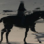 Riding like the wind on a Thoroughbred on the beach!